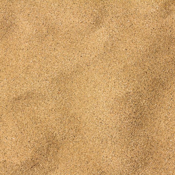 A closeup of light brown sand.