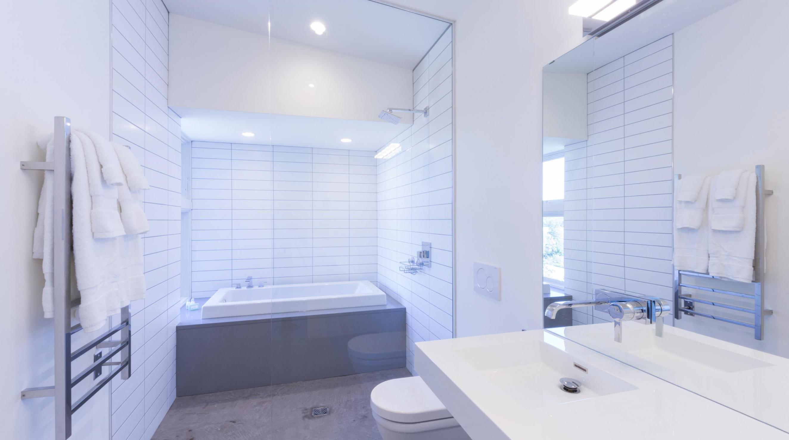 QuarterDeck Beach Lofts Modern Bath Concrete Glass